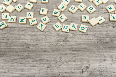 Directly above shot of text on wooden table