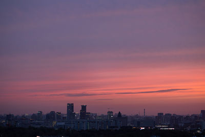 Cityscape against sky during sunset