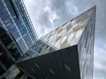 Low angle view of modern building against sky