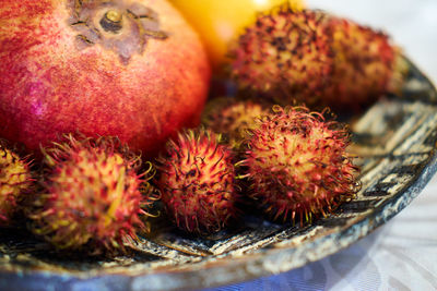 Close-up of fruits in plate