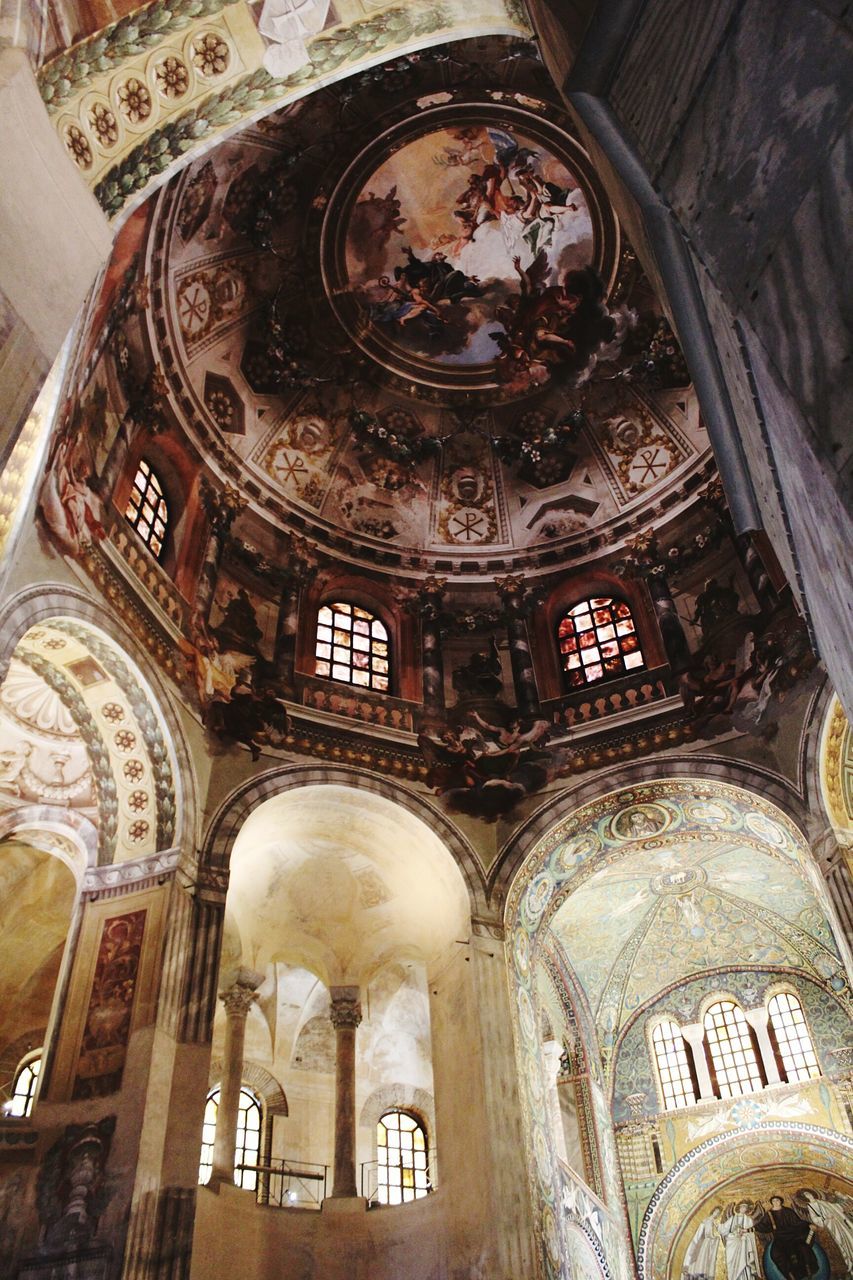 indoors, religion, low angle view, place of worship, spirituality, no people, architecture, day, fresco