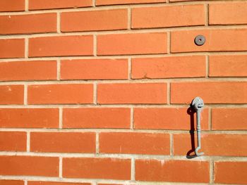 Full frame of red brick wall