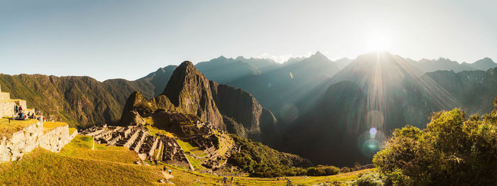 Panoramic view of rocky mountains against sky