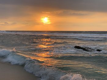 Scenic view of sea against sky during sunset