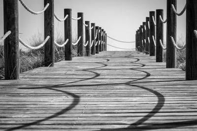 Surface level of wooden railing on footpath