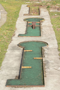 High angle view of empty bench in park