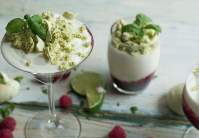 Close-up of fruit salad in glass on table