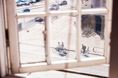 High angle view of bicycle on glass window