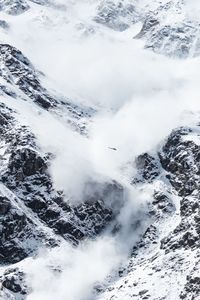 Aerial view of snow covered mountains