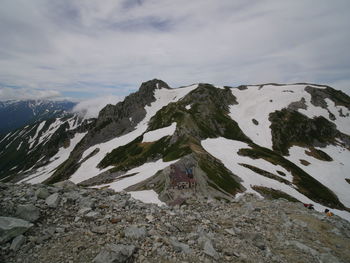 Scenic view of mountains against sky during winter