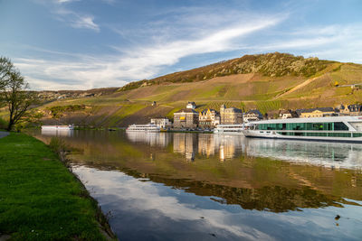 View at the city of bernkastel-kues at river moselle and mountains with vineyards