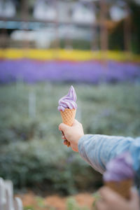 Woman holding ice cream cone