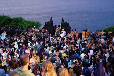 High angle view of people enjoying in sea