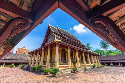 Scene inside wat si saket, a buddhist temple situated on lan xang road