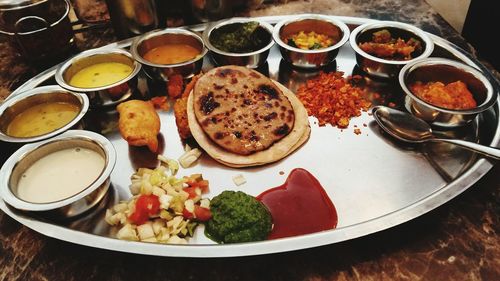 Close-up of food served on table