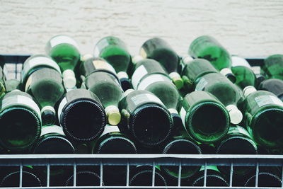 Full frame shot of wine bottles for sale in store