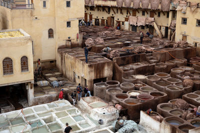 High angle view of people working on building