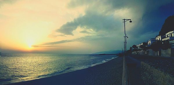 Scenic view of sea at sunset