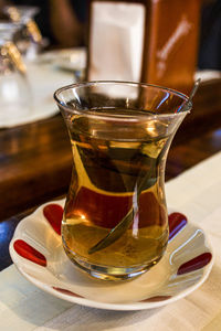 Close-up of tea cup on table