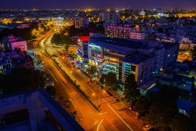 High angle view of illuminated cityscape at night