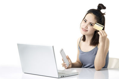 Young woman using mobile phone