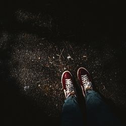 Low section of person standing on street