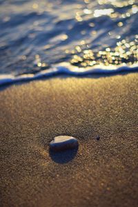 Close-up of pebbles on beach