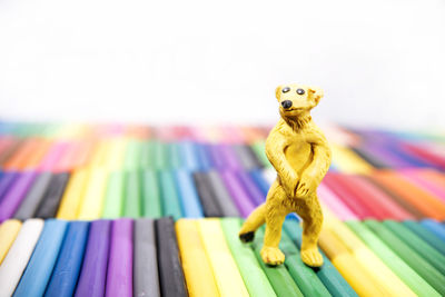 Close-up of multi colored pencils on table