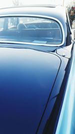 Close-up of blue car