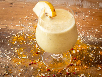 High angle view of drink in glass on table