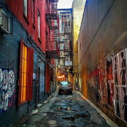 Narrow alley along buildings