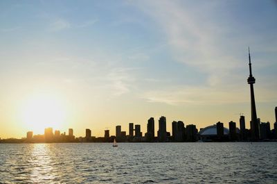 View of cityscape against sky during sunset