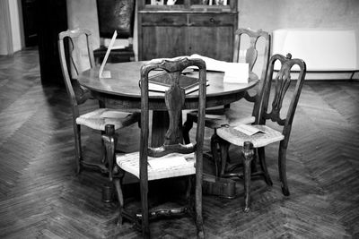 Empty chairs and tables in restaurant