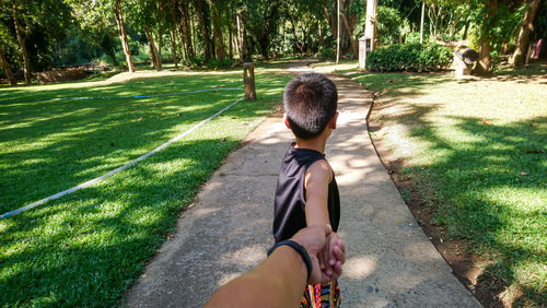 Full length of boy in park