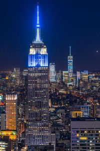 Illuminated buildings in city at night