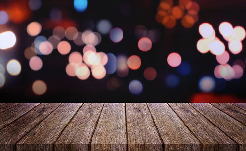 Defocused image of illuminated lights at night