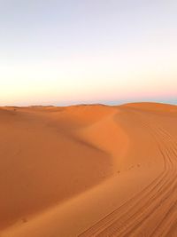 Scenic view of desert against clear sky