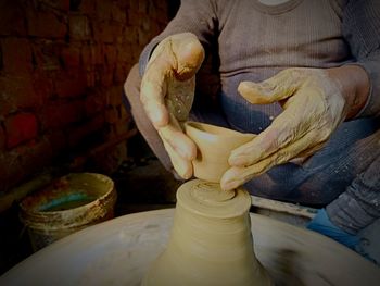 Midsection of man working