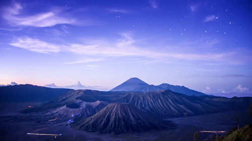 Volcanic landscape against blue sky