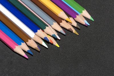 High angle view of colored pencils on table