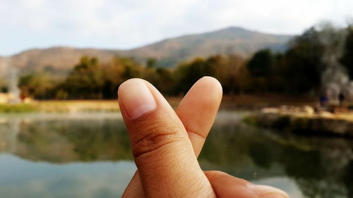 Close-up of hand holding water