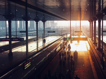 View of railroad station platform during sunset