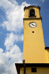 Low angle view of clock tower against sky