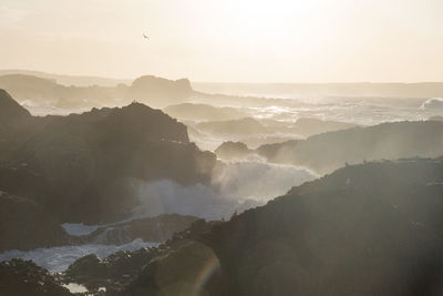 Scenic view of jagged coastline, near ballintoy, northern ireland, with waves crashing