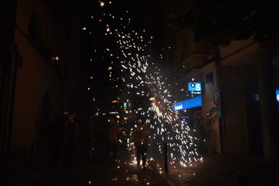 Firework display at night