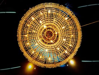 Low angle view of illuminated chandelier