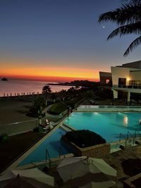 High angle view of swimming pool by sea against sky