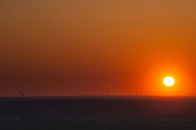 Scenic view of silhouette landscape against sky during sunset