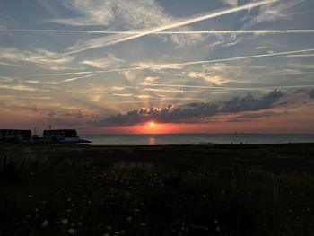 Scenic view of sea at sunset