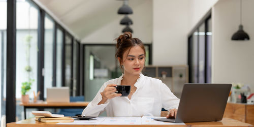 Businesswoman working at office